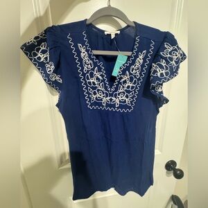 Maurices Navy Blue V-Neck blouse with White Floral Embroidery